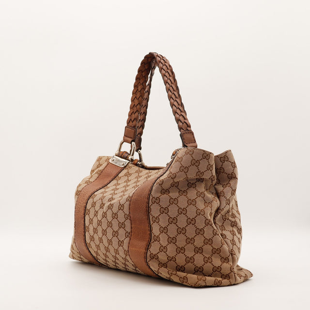 Tote Bag Bambou Gucci vue de côté gauche anses tressées cuir marron — AMANA Vintage