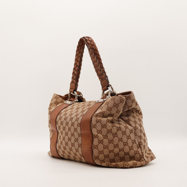 Tote Bag Bambou Gucci vue de côté droit anses tressées cuir marron — AMANA Vintage