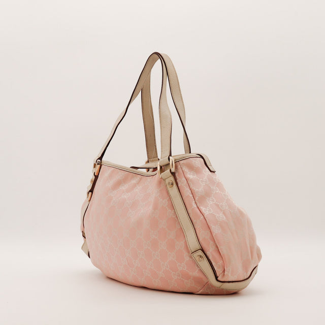 Gucci Hobo rose vue de côté droit cuir grainé beige anses — AMANA Vintage
