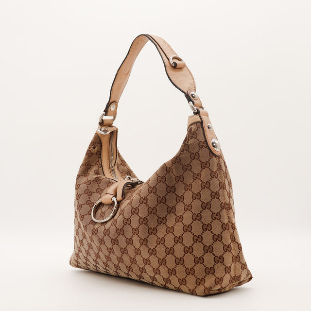 Hobo Gucci toile monogrammée vue de trois quarts cuir grainé beige — AMANA Vintage