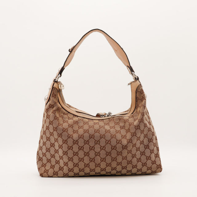 Hobo Gucci vue de trois quarts dos toile monogrammée cuir beige — AMANA Vintage