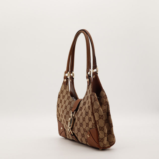 Profil gauche Gucci New Jackie toile GG anses cuir marron occasion — AMANA Vintage