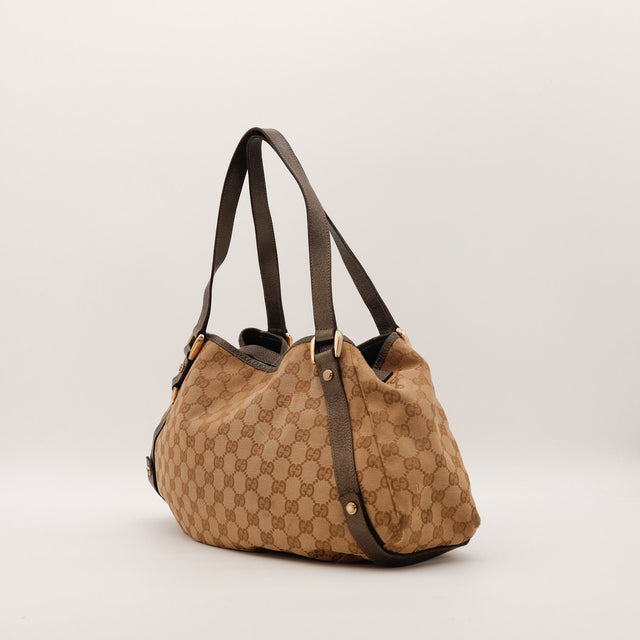 Hobo Gucci vue de trois quarts droite cuir marron — AMANA Vintage