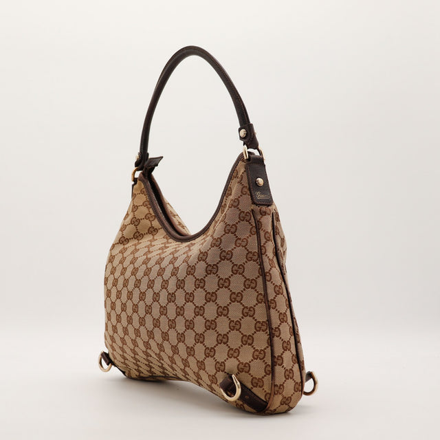 Vue laterale sac Gucci Tote Horsebit toile GG canvas occasion — AMANA Vintage