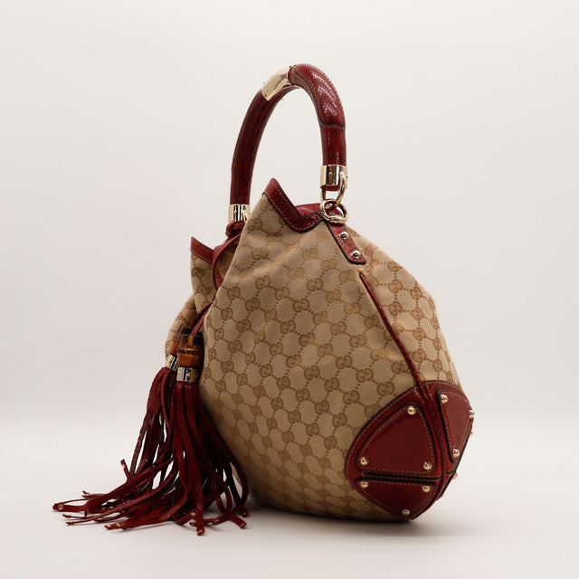 Profil gauche sac Gucci Indy Hobo python rouge et canvas beige — AMANA Vintage