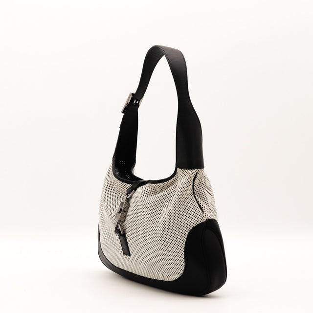 Vue de dos Gucci Jackie cuir perforé blanc et noir occasion authentique — AMANA Vintage