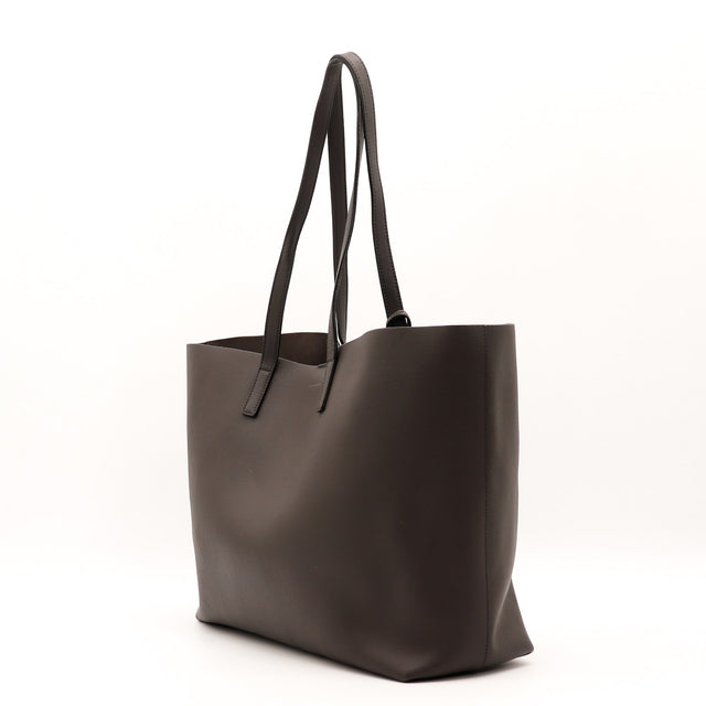 Vue de dos Saint Laurent Shopping Tote East/West cuir de veau gris foncé occasion authentique — AMANA Vintage