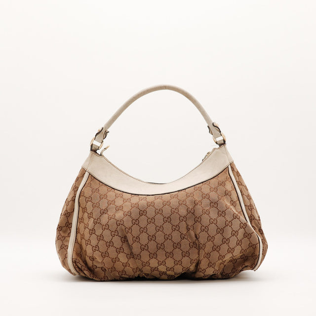 Hobo Gucci vue de face arrière toile monogrammée beige marron — AMANA Vintage