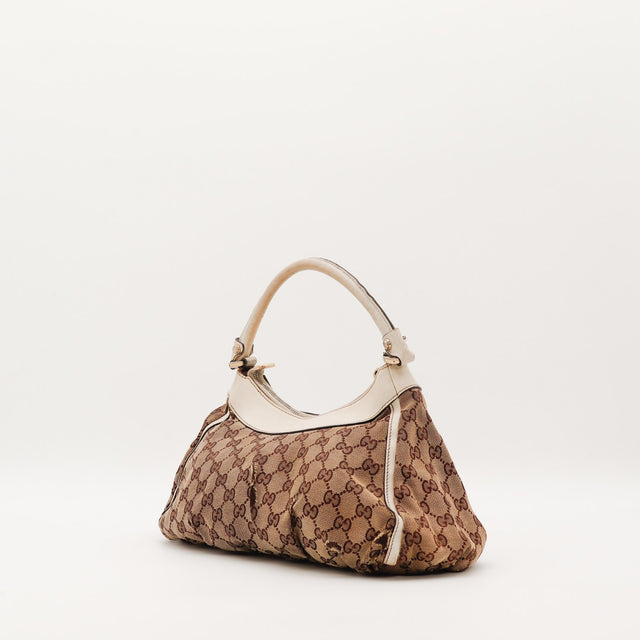 Sac Gucci Hobo toile monogrammée vue de dos occasion authentique — AMANA Vintage