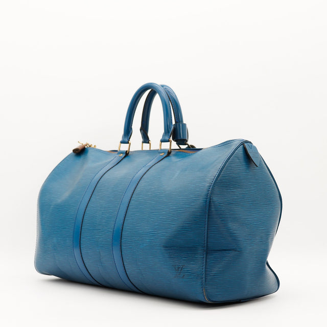 Louis Vuitton Keepall 50 Épi bleu vue trois quarts côté gauche occasion — AMANA Vintage
