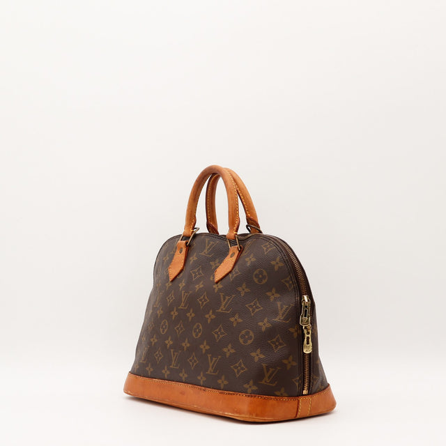 Intérieur du sac Louis Vuitton Alma PM occasion authentique — AMANA Vintage