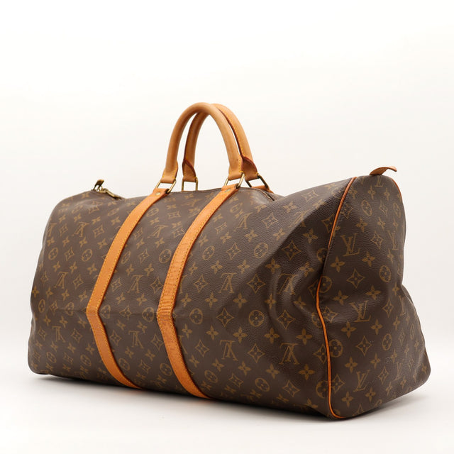 Vue de trois quarts arrière Louis Vuitton Keepall 55 toile Monogramme — AMANA Vintage