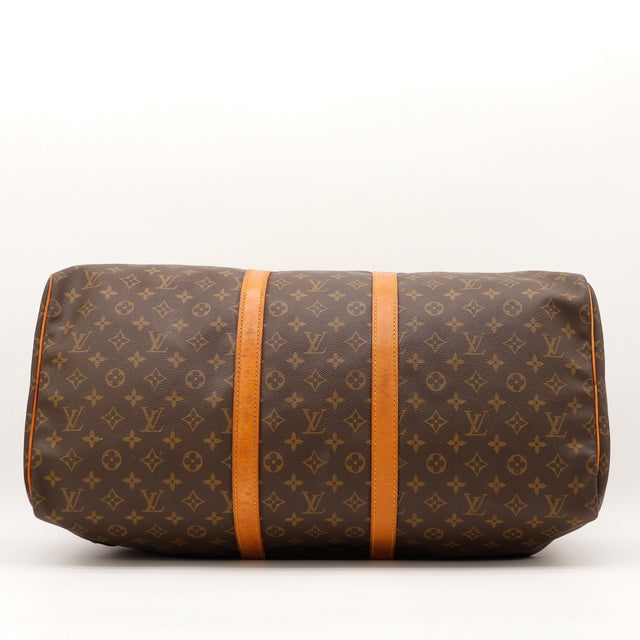 Vue du dessous Louis Vuitton Keepall 55 toile Monogramme bande vachette — AMANA Vintage