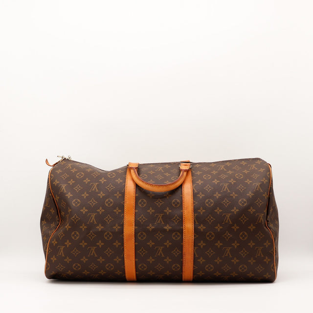 Détail du porte-adresse Louis Vuitton Keepall Toile Monogramme occasion authentique — AMANA Vintage