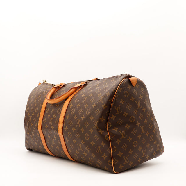 Détail des sangles à boucles Louis Vuitton Keepall Toile Monogramme occasion authentique — AMANA Vintage
