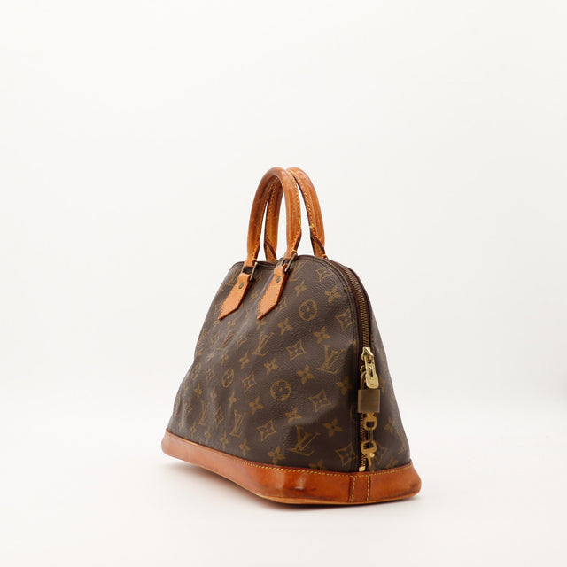 Louis Vuitton Alma PM vue de trois quarts droit cuir vachette patine occasion — AMANA Vintage