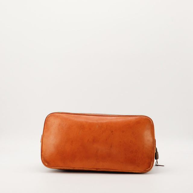 Detail fond Louis Vuitton Alma PM cuir vachette taches d'eau occasion — AMANA Vintage