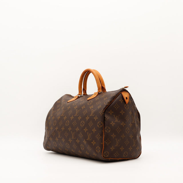 Vue de trois quarts Louis Vuitton Speedy 35 toile monogramme cuir vachette caramel — AMANA Vintage
