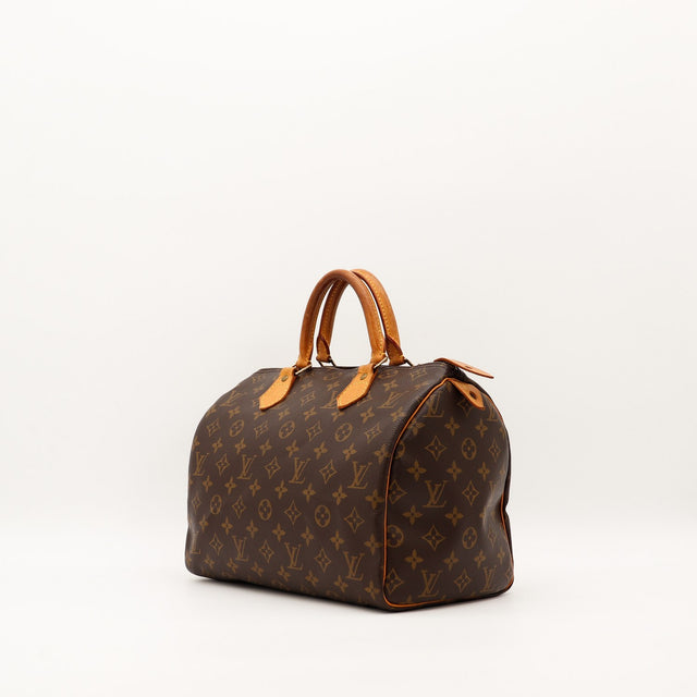 Louis Vuitton Speedy 30 vue trois quarts gauche toile monogramme patine caramel — AMANA Vintage