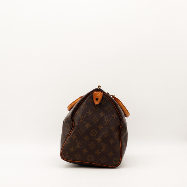 Vue de côté gauche Louis Vuitton Speedy 35 toile Monogramme — AMANA Vintage