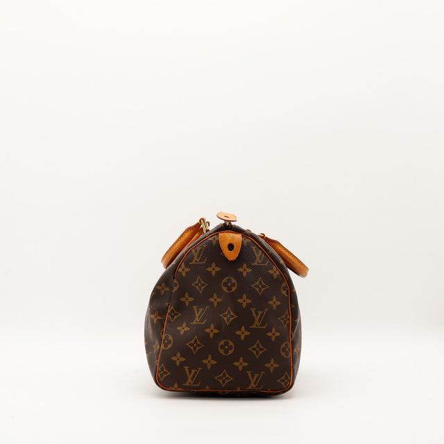 Louis Vuitton Speedy 35 vue de profil droit anses vachette patine caramel — AMANA Vintage