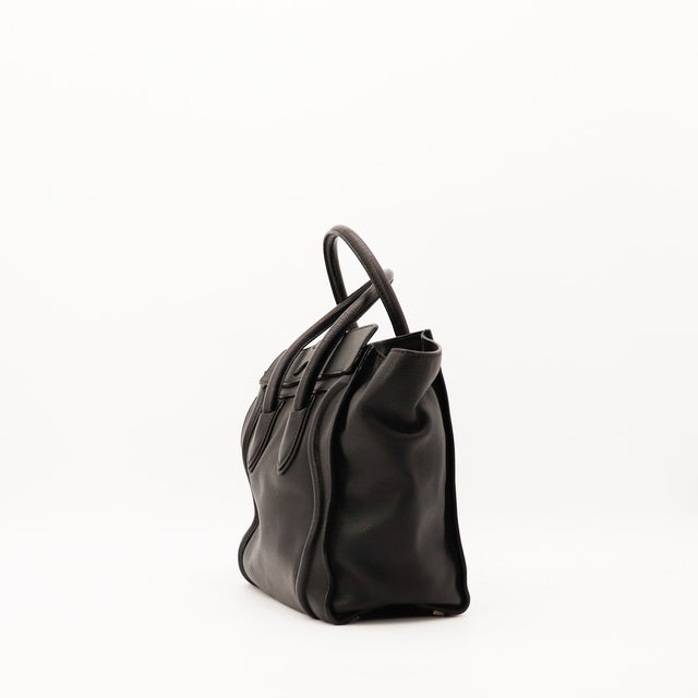 Détail anses Céline Luggage Micro cuir noir occasion authentique — AMANA Vintage