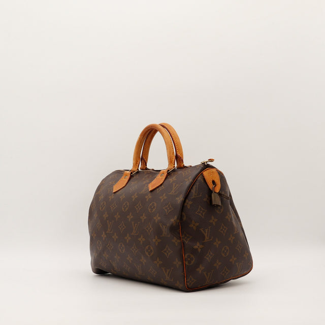 Vue trois quarts Louis Vuitton Speedy 30 toile Monogramme patine caramel — AMANA Vintage