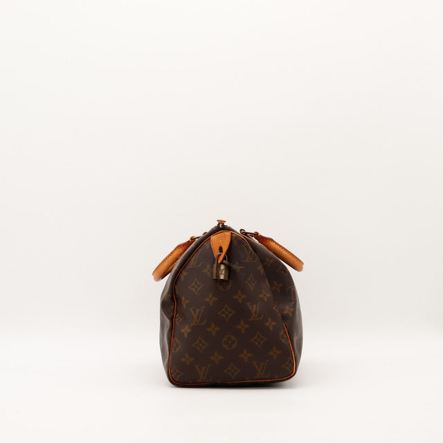 Vue de côté Louis Vuitton Speedy 30 avec cadenas et clé inclus — AMANA Vintage
