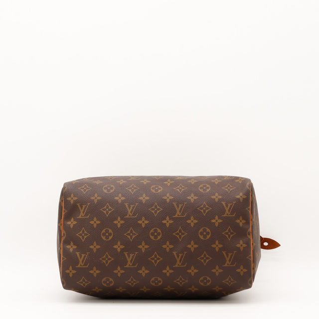 Détail de la tirette Louis Vuitton Speedy 30 Toile Monogramme occasion authentique — AMANA Vintage