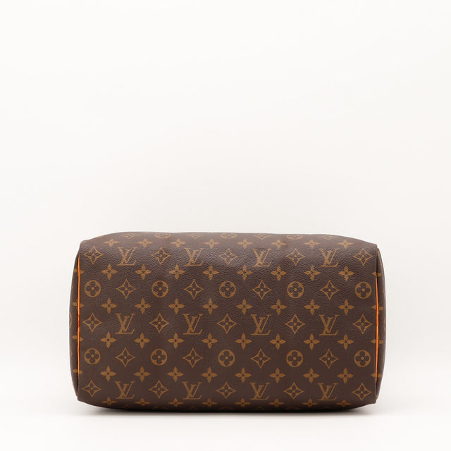 Détail de la fermeture éclair Louis Vuitton Speedy 35 Toile Monogramme occasion authentique — AMANA Vintage