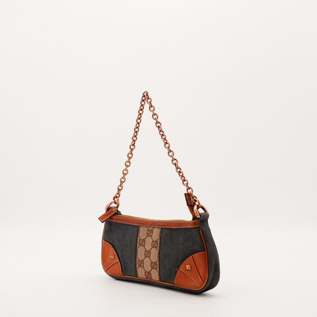 Pochette Gucci denim vue de trois quarts occasion authentique — AMANA Vintage
