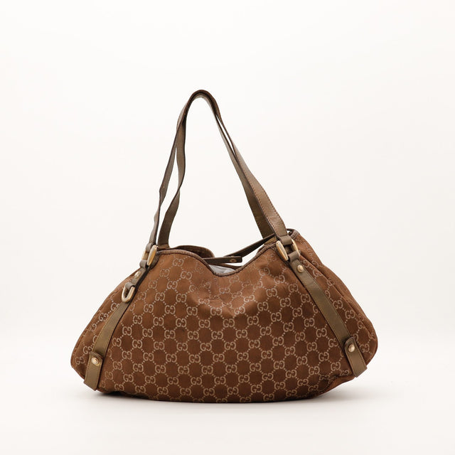 Sac Gucci Hobo toile monogrammée vue trois quarts occasion authentique — AMANA Vintage