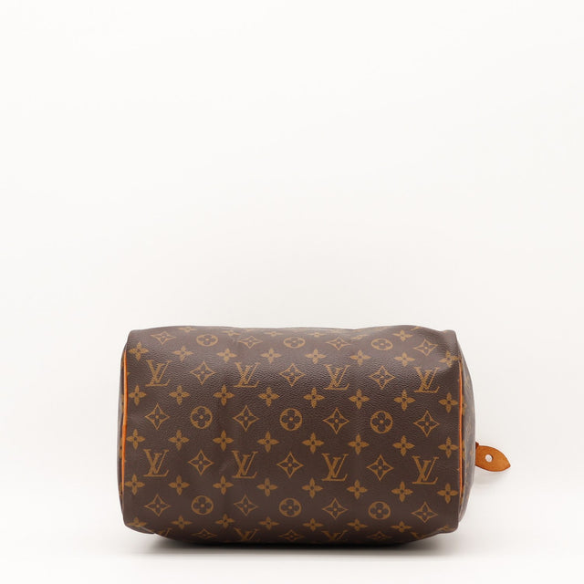 Détail de la tirette Louis Vuitton Speedy 30 cuir vachette occasion authentique — AMANA Vintage
