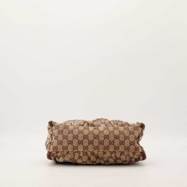 Détail fond toile monogrammée Gucci Hobo occasion authentique — AMANA Vintage