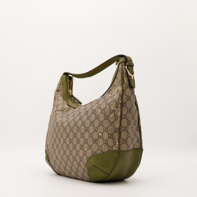 Sac Gucci Hobo toile monogrammée vue latérale occasion authentique — AMANA Vintage
