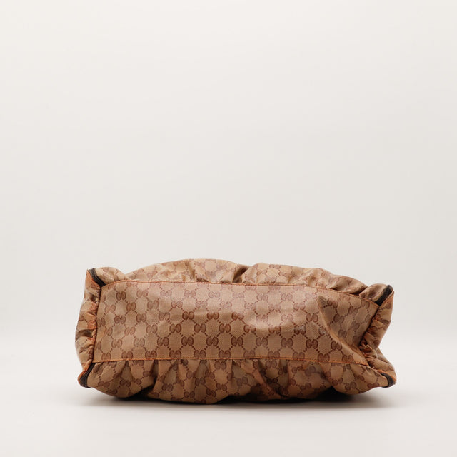 Détail fond Gucci Hobo D-Ring toile monogrammée occasion authentique — AMANA Vintage