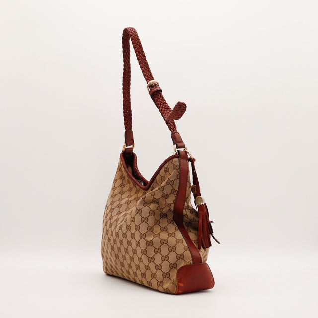 Sac Gucci Hobo profil silhouette souple bandoulière tressée occasion authentique — AMANA Vintage