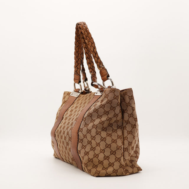 Sac Gucci Tote Bag Bamboo vue de côté anses tressées occasion authentique — AMANA Vintage