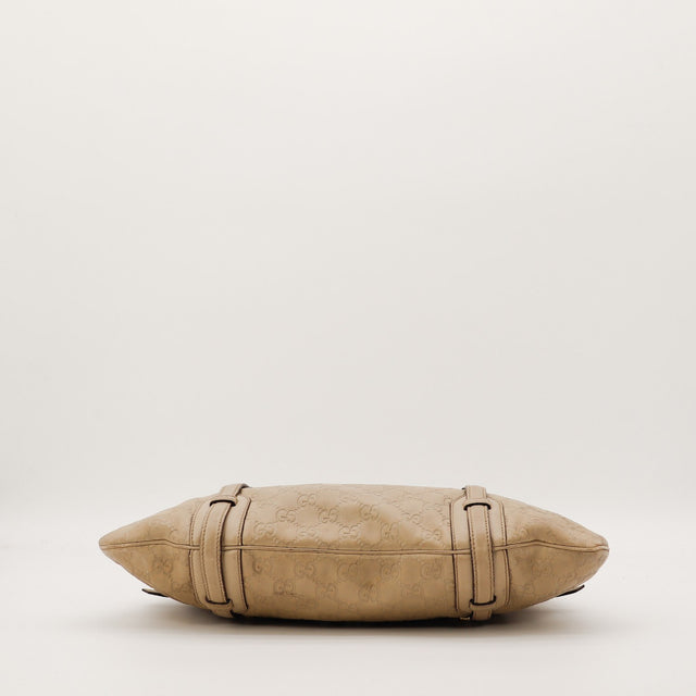 Détail base du sac Gucci Hobo Horsebit cuir Guccissima taupe — AMANA Vintage