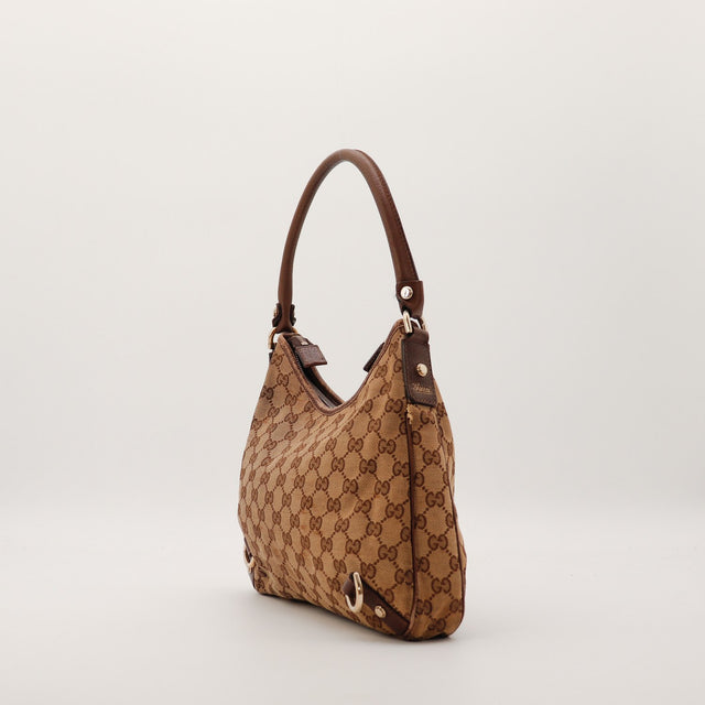 Sac Gucci Hobo toile monogrammée vue laterale occasion authentique — AMANA Vintage