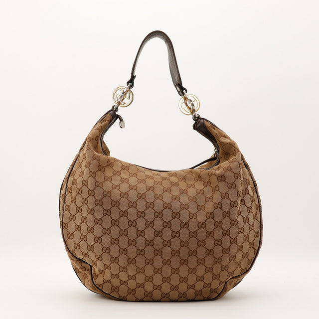 Sac Gucci Hobo GG vue trois quarts toile monogrammée occasion authentique — AMANA Vintage