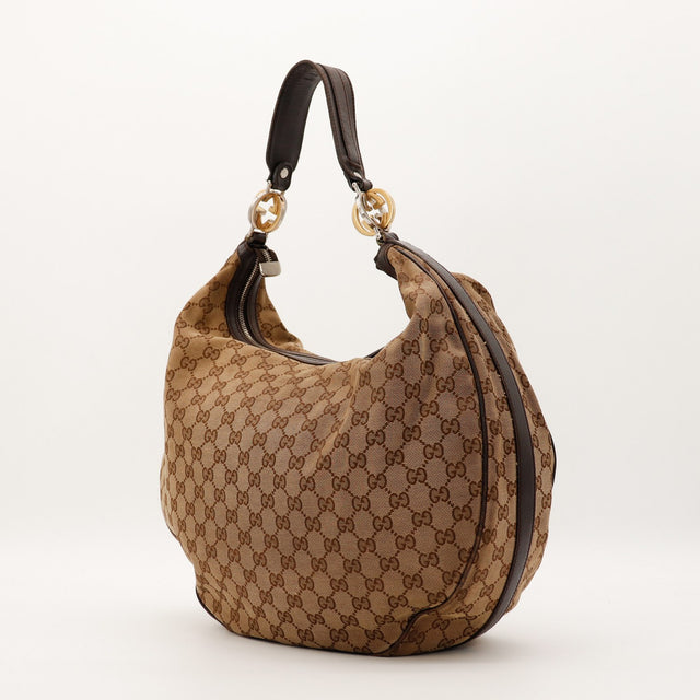 Sac Gucci Hobo GG vue latérale zip toile monogrammée occasion authentique — AMANA Vintage