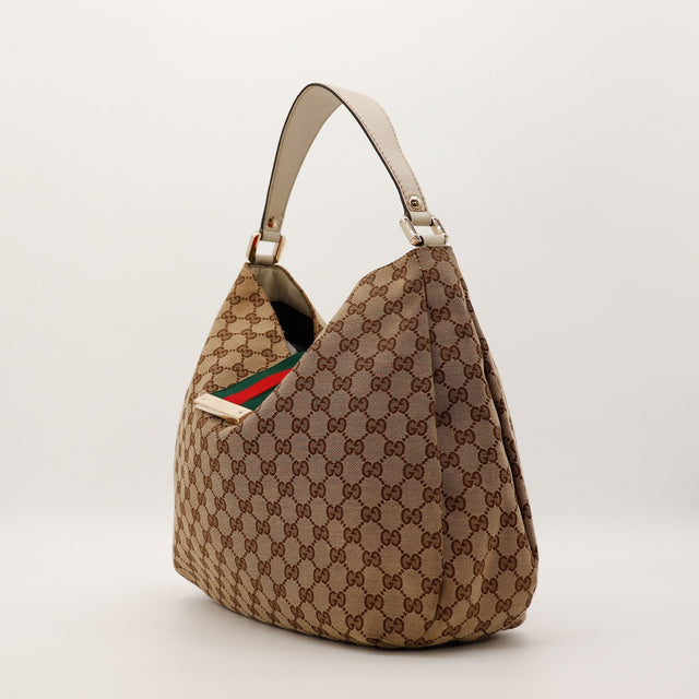 Sac Gucci Hobo Web vue de trois quarts anse cuir ivoire occasion authentique — AMANA Vintage