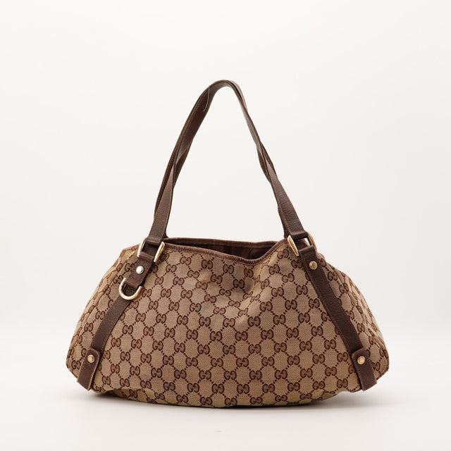 Sac Gucci Hobo anses cuir marron vue laterale occasion authentique — AMANA Vintage