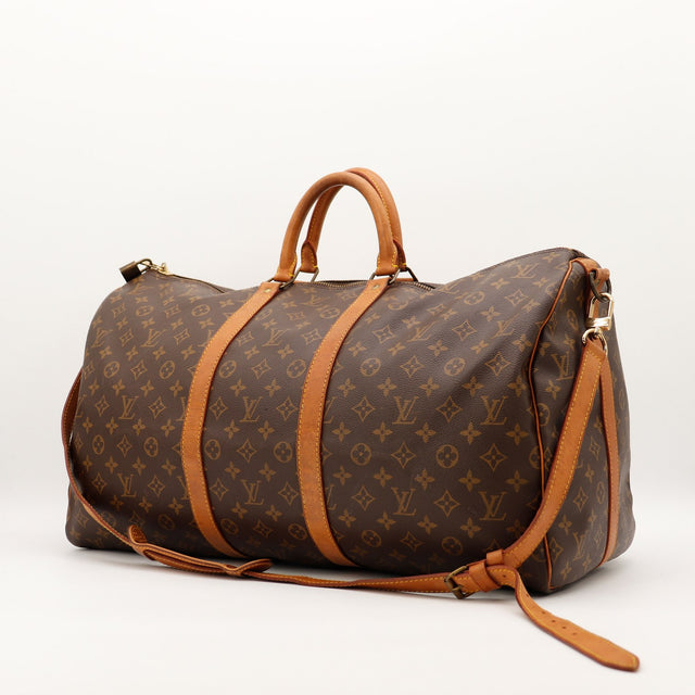 Louis Vuitton Keepall 55 vue trois quarts avec bandoulière occasion authentique — AMANA Vintage