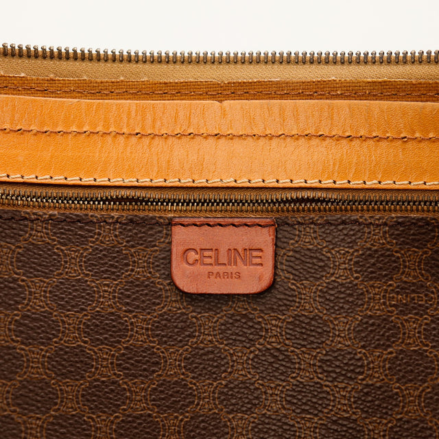 Détail estampille Céline Paris intérieur sac de voyage Macadam — AMANA Vintage