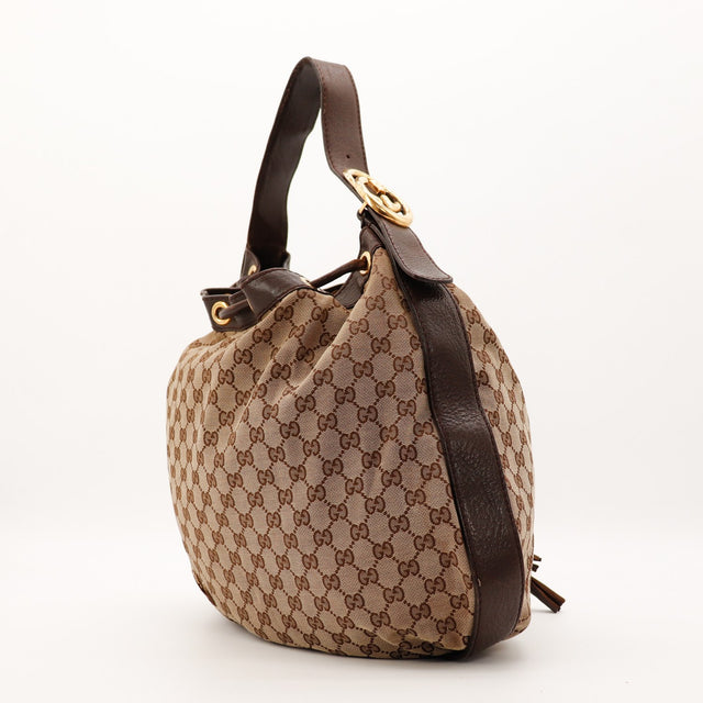 Sac Gucci Hobo GG silhouette souple vue laterale occasion authentique — AMANA Vintage