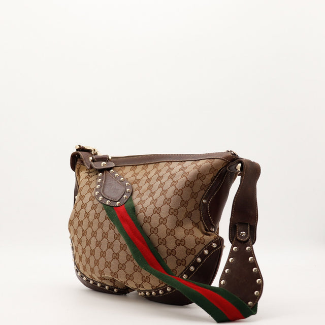 Sac Gucci Hobo Web cuir et bande Web vue de trois quarts occasion authentique — AMANA Vintage