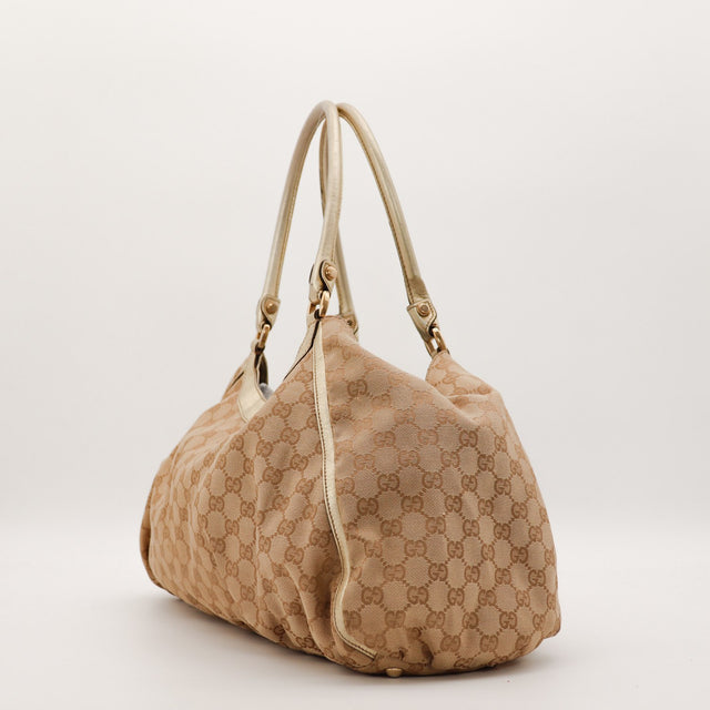 Détail vue latérale sac Gucci Hobo toile monogrammée — AMANA Vintage