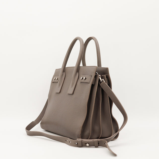 Saint Laurent Sac de Jour Small vue de trois quarts soufflets accordeon taupe occasion — AMANA Vintage